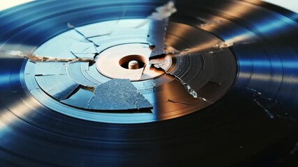 Poster - Close-up of a Broken Vinyl Record with Cracks on Surface, Capturing the Unique Texture and Reflection of Light in an Artistic, Abstract Style