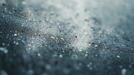 Poster - Close-up view of a textured surface with specks of dust and subtle gradients, evoking a moody atmosphere