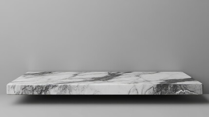 Poster - Elegant marble countertop showcasing intricate veining against a minimalist gray background, perfect for modern interiors