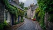 © Nuttaya Nampai - Classic Mews street in Edinburgh, lined with charming cottages, cobbled roads, and climbing ivy.