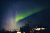 Aurora borealis, polar lights with Milky Way stars.