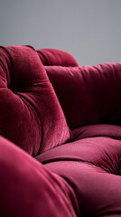 Aufkleber - Close-up of burgundy velvet couch cushions, showing texture and depth, representing luxury, comfort, and relaxation, ideal for home decor or furniture websites