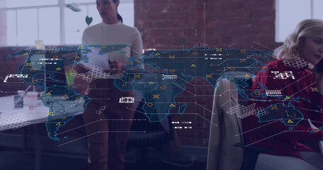 Poster - In modern office, animation of world map with data points overlaying workers