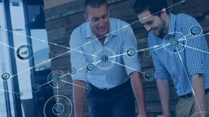 Poster - In office, businessmen collaborating using digital network overlay animation on laptops