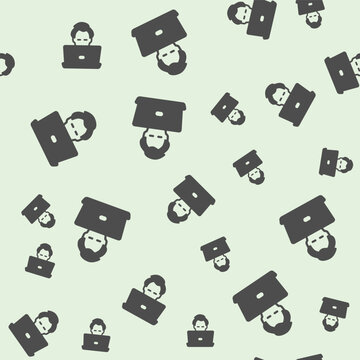 Freelancer guy with laptop solid seamless pattern, remote work theme. Vector graphics. Man, person and computer sign background, filled with glyphs icon.