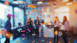 © RIFKI DWI - Office party celebration with flying confetti and blurred business people, festive atmosphere for corporate events and success milestones.