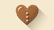 © Sergey - Heart-shaped gingerbread cookie with icing decoration