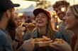 © Viktoriia - Group of friends enjoying street food at a festival during golden hour