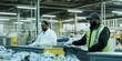 © MikeLegend - Workers sort recyclables in a bustling waste management facility