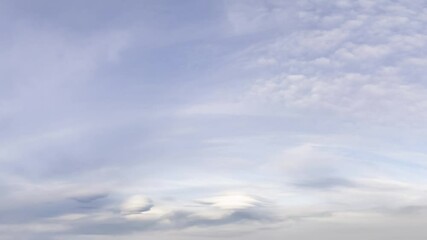 Wall Mural - Panoramic Cinemagraph of Clouds Gently Drifting Across a Serene Sky