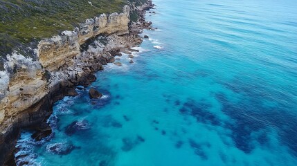 Aufkleber - Aerial view of a beautiful rocky coastline with clear turquoise water and waves : Generative AI