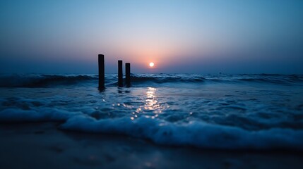 Aufkleber - Stunning sunset over calm ocean waves with wooden poles silhouetted against colorful sky : Generative AI