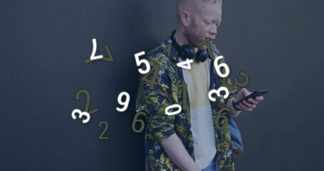 Poster - Man using smartphone with floating numbers animation over dark background