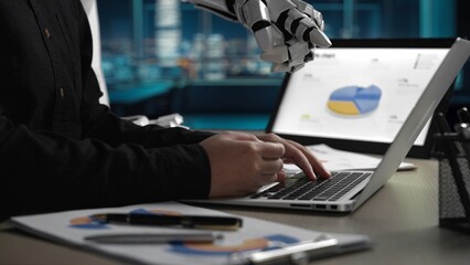 Poster - a human hand works on a laptop while a robotic arm reaches out, highlighting the collaboration betwe