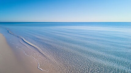 Poster - Serene and Tranquil Ocean View with Gentle Waves and Clear Blue Sky : Generative AI