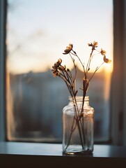 Aufkleber - Charming glass vase with dried flower branches illuminated by golden hour sunlight indoors : Generative AI