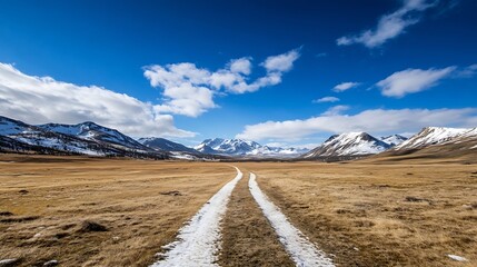 Aufkleber - Expansive Mountainous Landscape with SnowCovered Trail Underneath a Bright Blue Sky : Generative AI