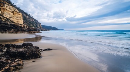 Aufkleber - A scenic beach view with cliffs and waves creating a tranquil coastal landscape : Generative AI