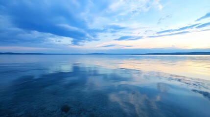 Poster - Stunning landscape of calm water reflecting clouds at twilight creating a tranquil atmosphere : Generative AI