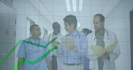 Poster - Discussing patient data, doctors with financial graph overlay in hospital corridor
