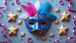 © Giovanni - Happy Purim carnival decoration idea created with a mask, sparkly stars, and hamantaschen cookies on a pastel backdrop.
