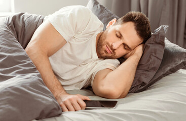 Aufkleber - Smartphone Addiction Concept. Man Sleeping Holding Mobile Phone Lying In Bed At Home, Always In Touch. Selective Focus