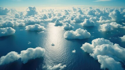Wall Mural - A stunning aerial perspective of the ocean featuring a wide stretch of fluffy white clouds dispersed above the surface. The clouds create a striking contrast with the deep blue water.