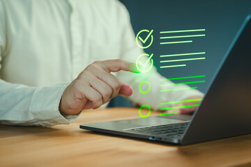 Fototapete - User hand pointing at a virtual checklist with completed tasks on a laptop, Concept of task management, service, quality control, productivity, and efficient work processes in a digital environment.