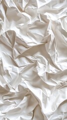 Poster - Crumpled white surface with dramatic lighting. Soft shadows create texture. Abstract design element.