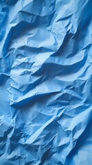 Poster - Abstract texture in blue of crumpled material with unique shapes and light creating shadows across surface.