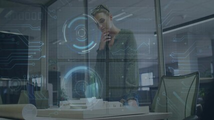 Poster - In office, architect examining model with animation overlay on digital interface