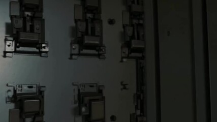 Poster - Dimly lit control room panel sequence with shadow play and industrial vibes
