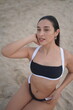 © AMUL BABY OFFICIAL - young woman in bikini on beach