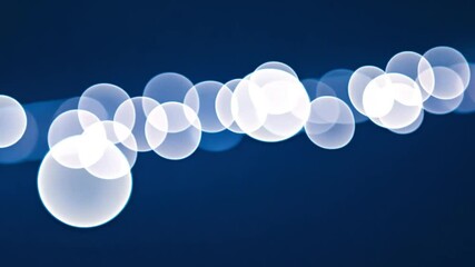 Poster - Abstract Bubbles of Light: A captivating abstract image of glowing, spherical bubbles against a deep blue backdrop, creating a sense of ethereal beauty and dynamic flow.