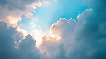 sunlight breaking through fluffy clouds, bright sky, natures beauty, serene atmosphere, inspiration 