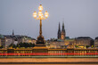 Streetlamp with city view of Hamburg's Binnenalster at night