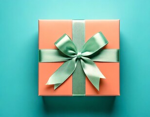 Poster -  A coral gift box, elegantly adorned with a pale green ribbon bow, sits on a teal backgroun