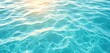 © Kathy - Sunlit turquoise water with gentle wave texture, light, natural