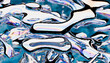 © Westend61 - Abstract 3D render of metallic liquid waves with iridescent colors
