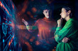 © Westend61 - Two people collaborating on an augmented reality screen in a futuristic workspace