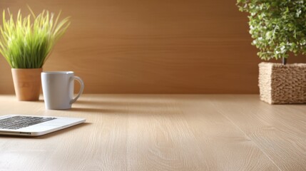 Poster - Laptop placed next to a green plant creating a fresh and inviting workspace atmosphere