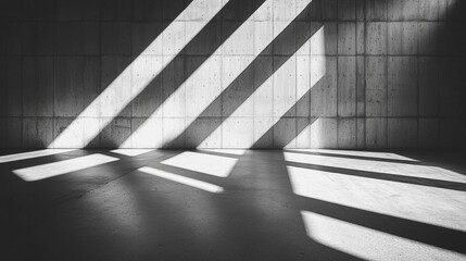 Fototapete - Sunlight filters through gaps, casting dynamic shadows across a bare concrete wall. The interplay of light and shadow creates an intriguing visual journey in the quiet space