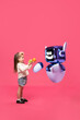 © master1305 - Composite image of girl interacting with 3D model of robot, child giving fruits, illustrating friendly cooperation between child and machine. Concept of innovation, technologies, human and robots