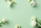 White lisianthus flowers on a pastel green background. Minimalist and elegant design, perfect for invitations, floral ar