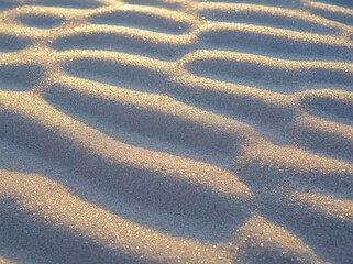 Poster - Ripples of shimmering sand create an abstract landscape in a serene environment