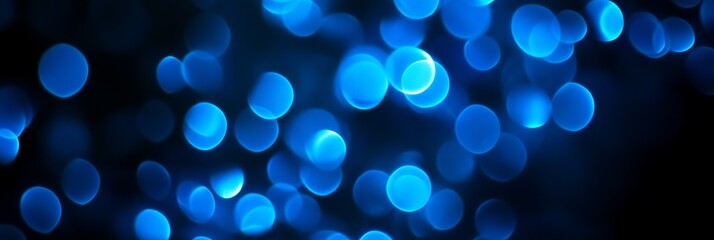 Poster - Vibrant blue bokeh effect creates an abstract atmosphere with soft glowing circles