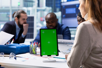 Poster - photovoltaics factory investors analyzing data using isolated screen tablet, reviewing system health
