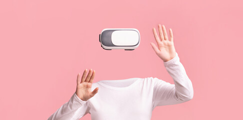 Poster - A user wearing a virtual reality headset interacts with an immersive environment. The person is isolated against a pink background, hands raised in a virtual experience.