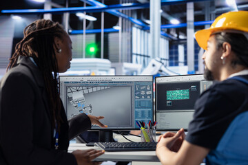 Poster - teamworking photovoltaics factory colleagues using tablet to do finetuning of system settings for ma