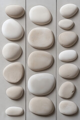 Poster - Arranged white and beige stones create a minimalist decoration for indoor spaces